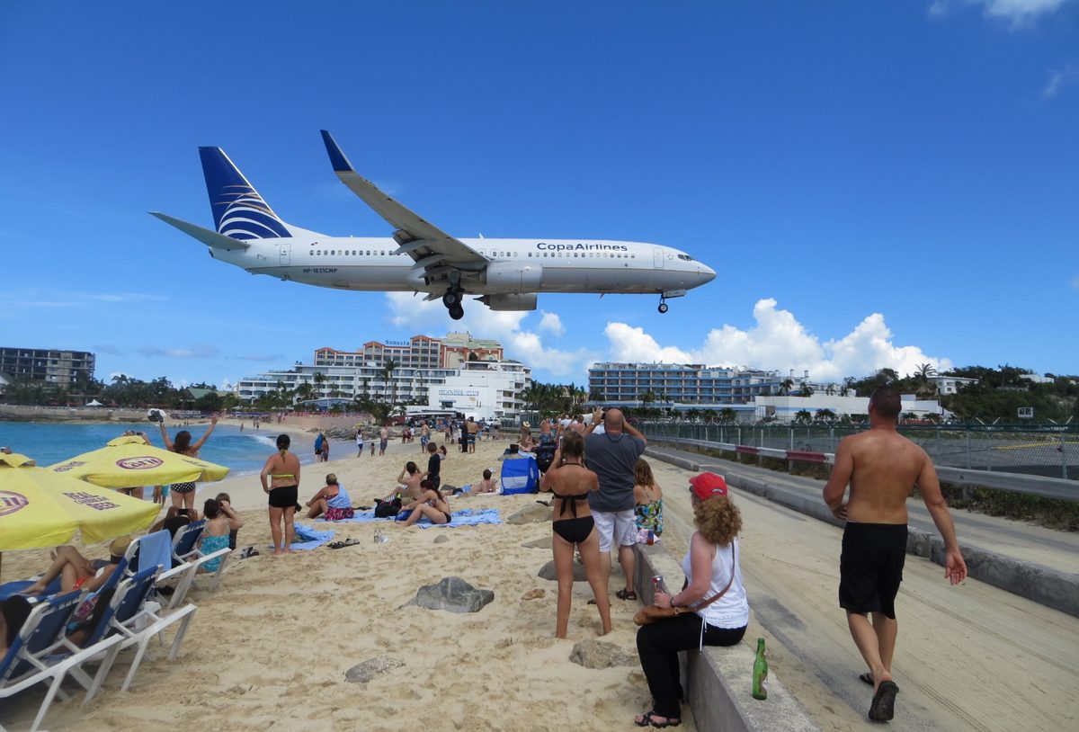 Copa Airlines aircraft on low approach over Maho Beach, St. Maarten - close enough to read the livery